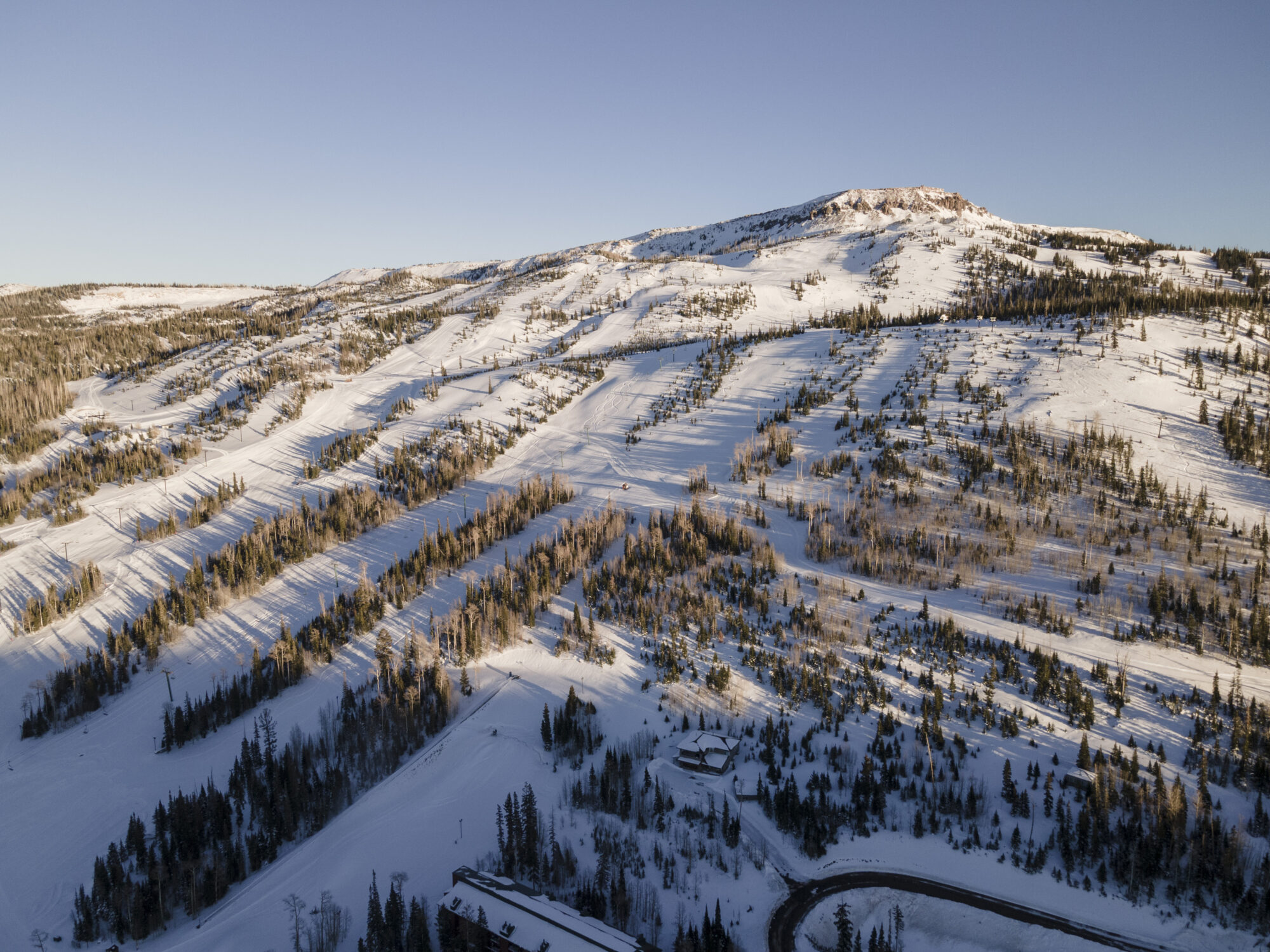 Brian Head Resort Peak sunrise with pines aspens and ski runs