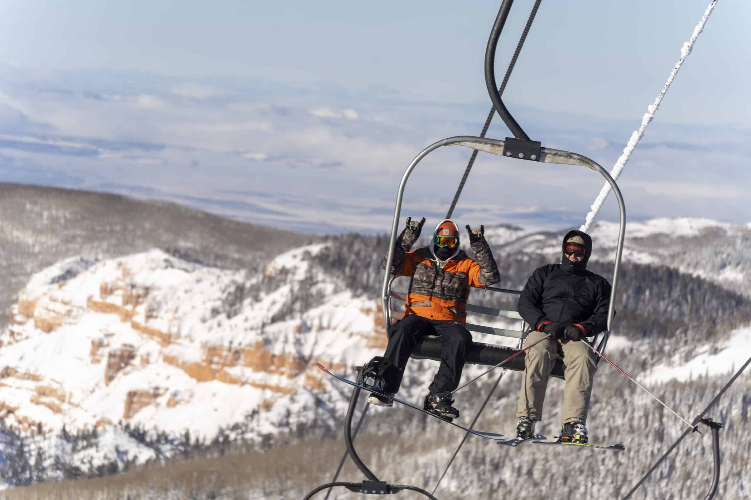 stoke on the chair lift over Cedar Breaks National Monument 2023/2024 Season Pass On Sale Now